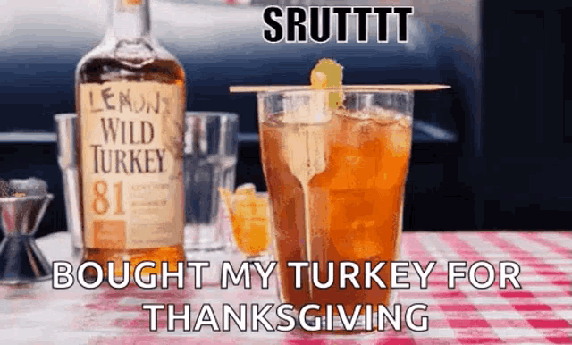 a bottle of lemon wild turkey 81 next to a glass of iced tea