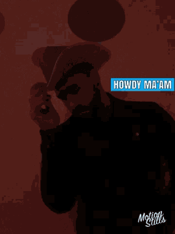 a man wearing a light up cowboy hat with the words howdy ma 'am below him