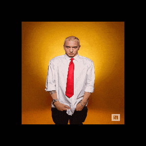 a man in a white shirt and red tie stands in front of an orange background