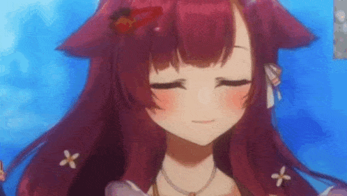 a close up of a girl with red hair and a necklace with her eyes closed .
