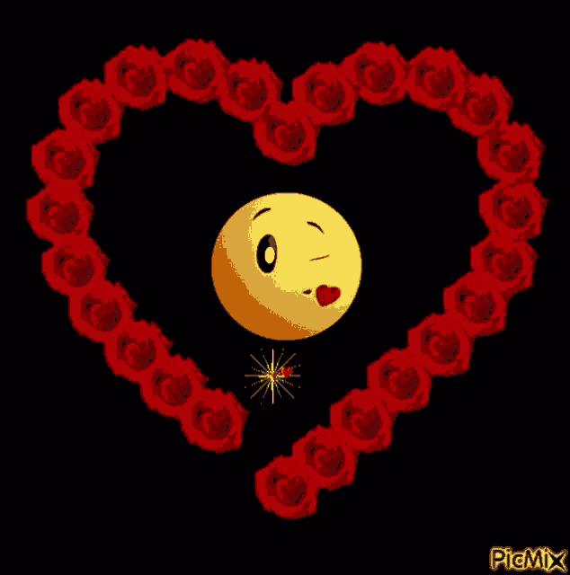 a heart made of red roses and a smiley face