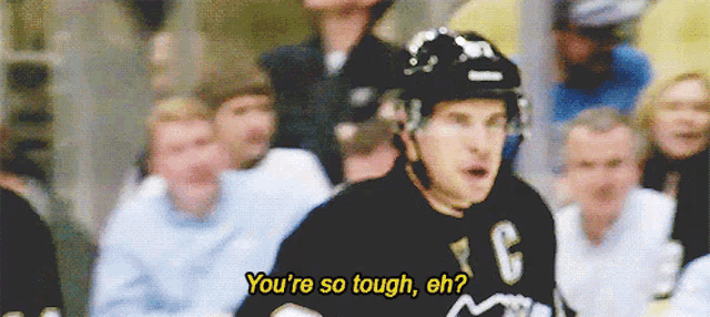 a hockey player with the letter c on his jersey