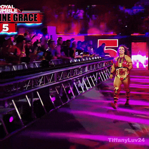 a woman in a wrestling outfit is walking down a ramp with a sign that says " one grace " on it