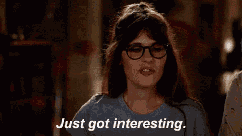 a woman wearing glasses says " just got interesting "