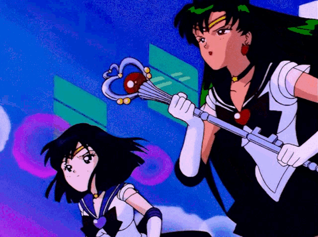 a couple of anime characters standing next to each other with one holding a wand