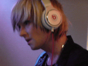 a person wearing a pair of beats headphones on their ears