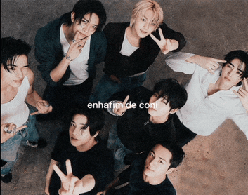 a group of young men are standing in a circle with the words enhajimide coni written on the bottom