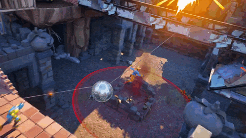 an aerial view of a video game scene with a red circle around a sphere