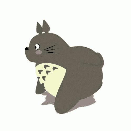 a cartoon totoro is running on a white background and looking at the camera .
