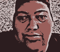a pixelated image of a man 's face with a slight smile