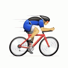 a man is riding a red bicycle with a helmet on .