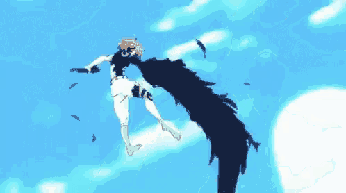 a person is flying through the air in a blue sky with clouds .