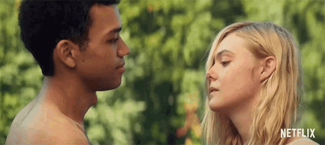 a man and a woman are looking into each other 's eyes with netflix written on the bottom
