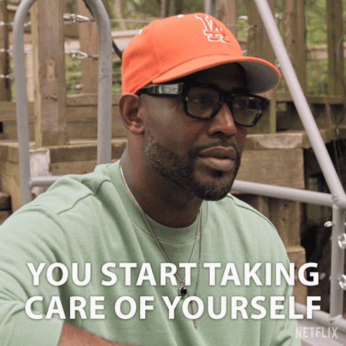 a man wearing glasses and an orange hat says you start taking care of yourself
