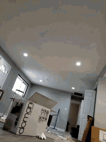 a kitchen with a box on the counter that says ' fragile '