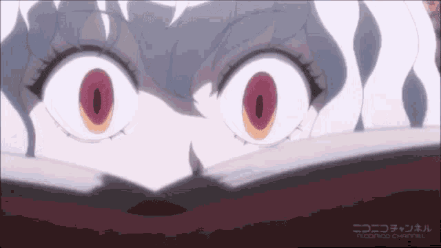 a close up of a person 's eyes with the niconico channel written on the bottom right