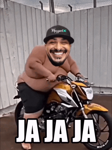 a man is riding a motorcycle with the words ja ja ja on the front