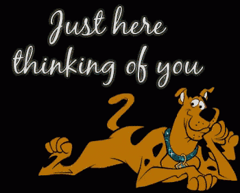 scooby doo laying down with the words " just here thinking of you "