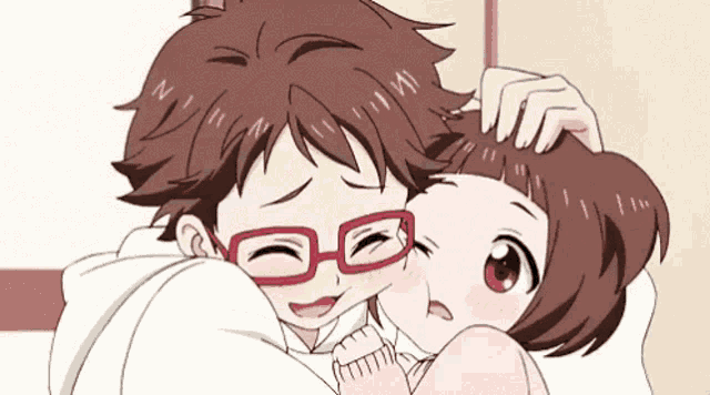 a boy with red glasses is hugging a girl with brown hair