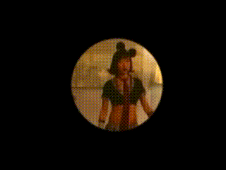 a woman in a mickey mouse costume is in a circle