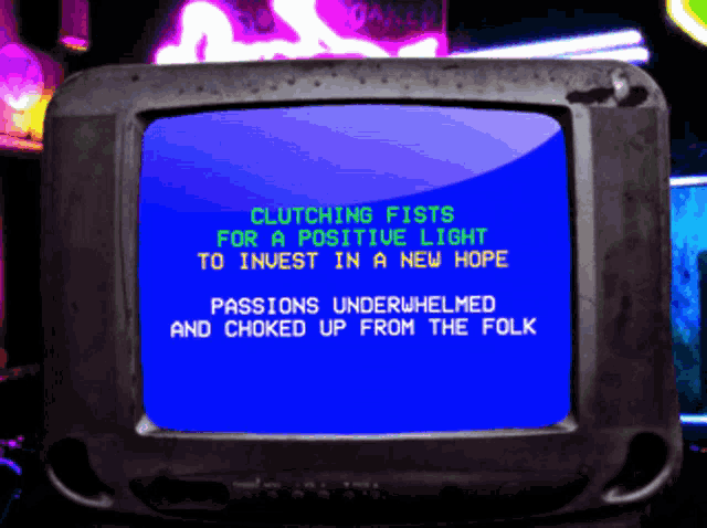 a blue screen with the words clutching fists for a positive light