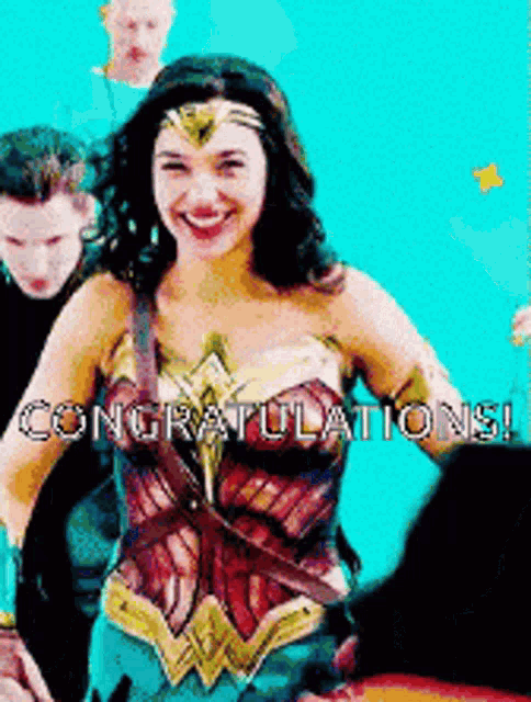 a woman in a wonder woman costume with the words congratulations on the bottom