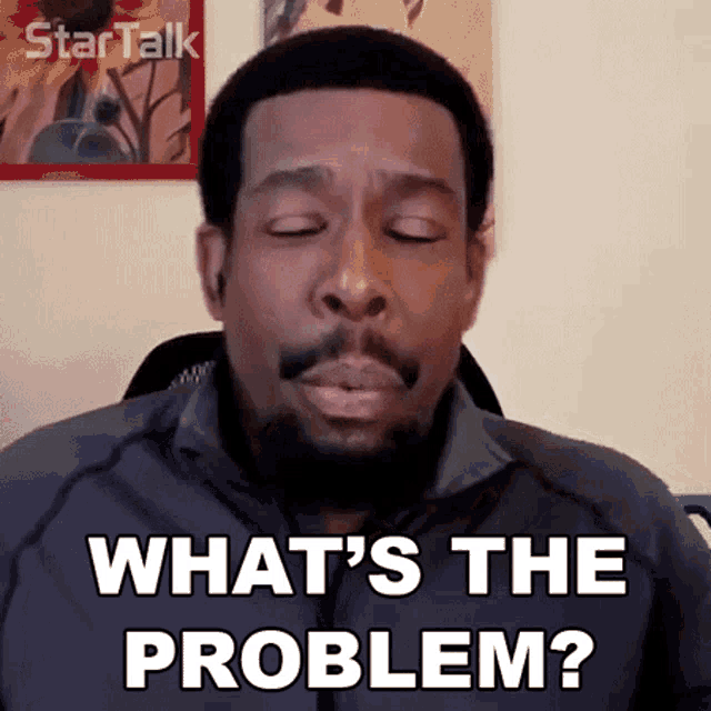 a man with his eyes closed is asking what 's the problem