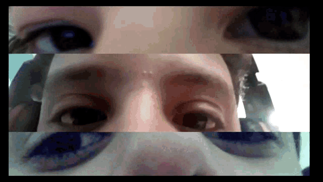 a close up of a person 's eyes with a white background in the middle