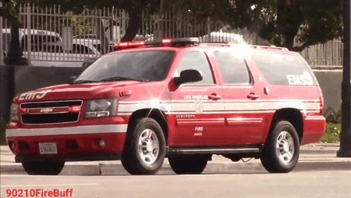a red suv that says ems on the side
