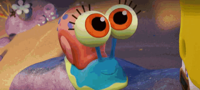 gary the snail from spongebob squarepants is smiling