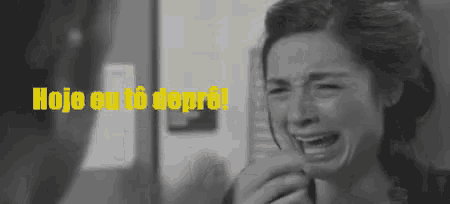 a woman is crying in a black and white photo with the words hoje eu to depro written in yellow