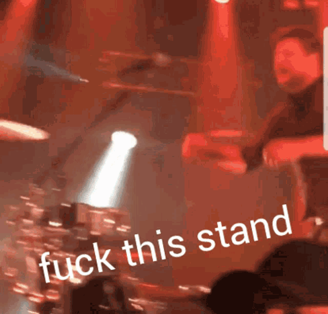 a man playing a trumpet with the words " fuck this stand " on the bottom