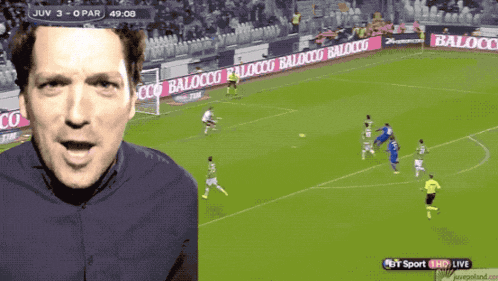 a man is watching a soccer game on a bt sport live stream