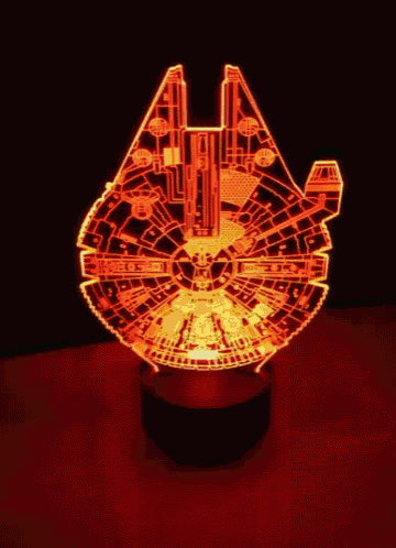 a light that looks like the millennium falcon is on a table