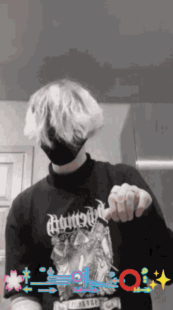 a person wearing a mask and a shirt that says ' almost ' on it