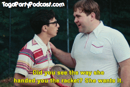 a man holding a tennis racquet talks to another man with a togapartypodcast.com logo behind them
