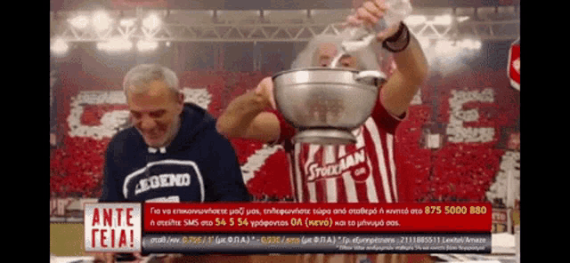 a man in a stockman shirt pours water into a bowl