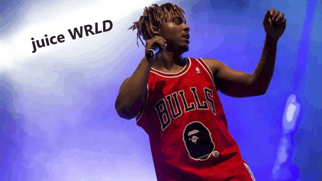 juice wrld is wearing a bulls jersey and singing into a microphone