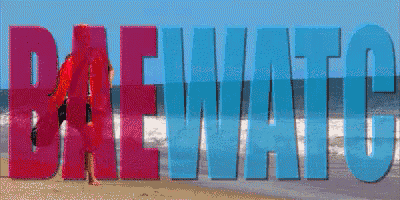 the word baywatch is on the beach with a lifeguard
