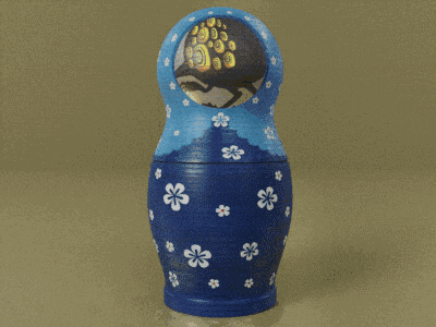 a blue green and orange nesting doll with white flowers