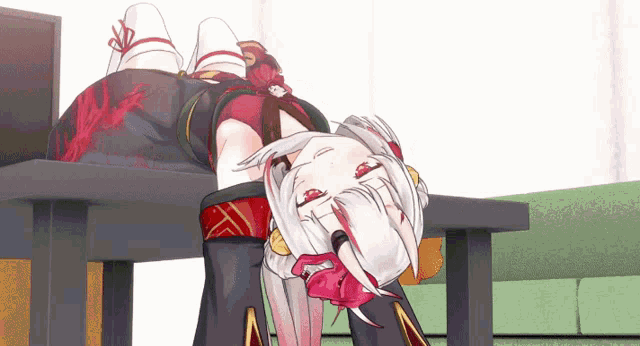 a cartoon character is laying on a table with her head on it