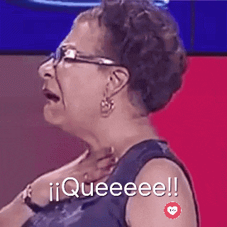 an older woman wearing glasses and earrings is making a funny face and saying queeeee !!