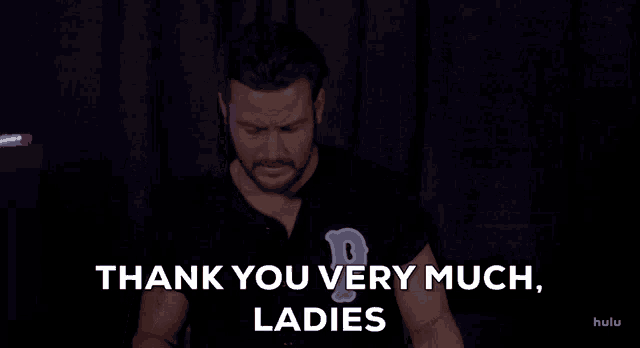 a man says thank you very much ladies in a dark room