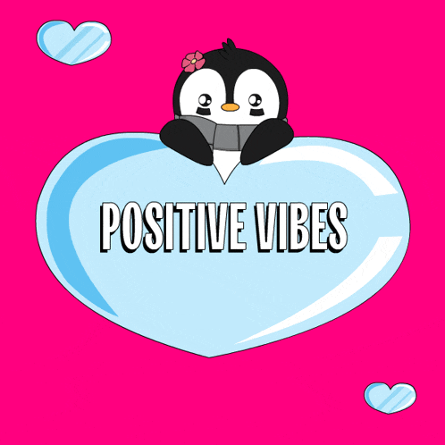 a penguin is sitting on a heart that says " positive vibes "