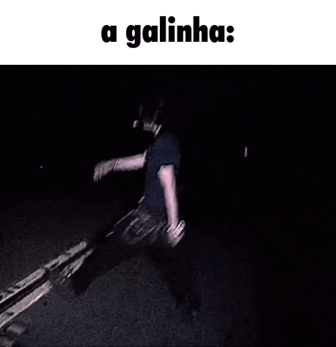a man is running in the dark with the words a galinha written on the bottom .