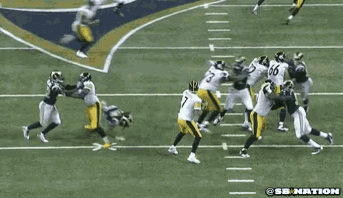 a football game is being played on a field with a logo for sb nation