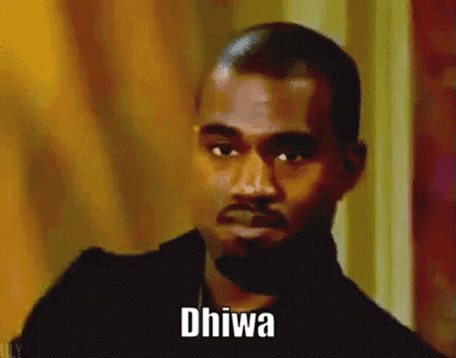 a close up of a man 's face with the word dhiwa on the bottom