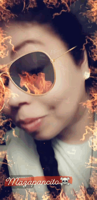 a woman wearing sunglasses is surrounded by flames and the name mazapancito