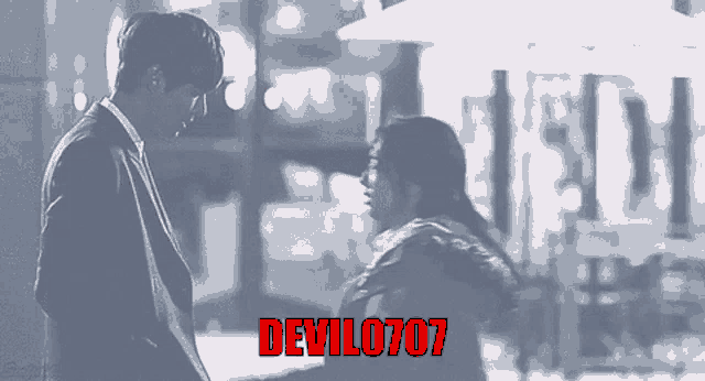 a man and a woman are standing next to each other with devil0707 written on the bottom