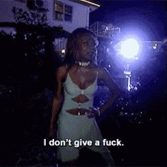 a woman in a green dress says i don 't give a fuck .